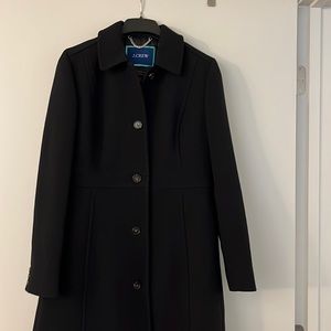 Brand new. Never worn. Size 10 classic woman’s coat. Beautiful details.
